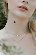 TINY CROSS NECKLACE - GOLD